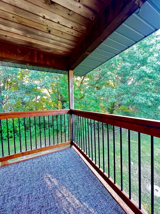 Covered porch, this 2 unit property sits serenely on one acre, offering more privacy than other twinhome communities in town!