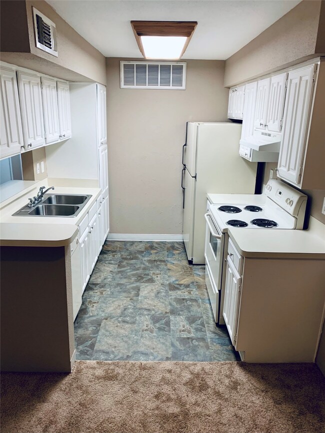 Travertine tiled kitchen
