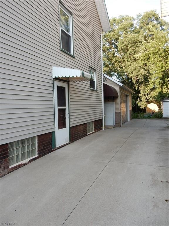 The concrete driveway is in excellent condition.