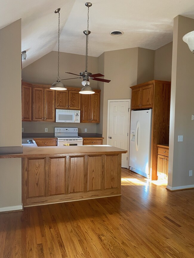 open floor plan with soaring ceilings