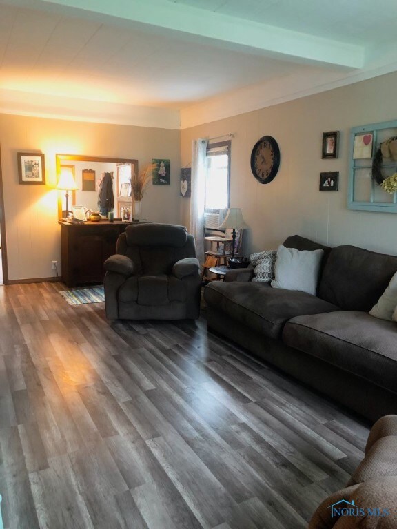 Living Room.  New laminate flooring and freshly pa