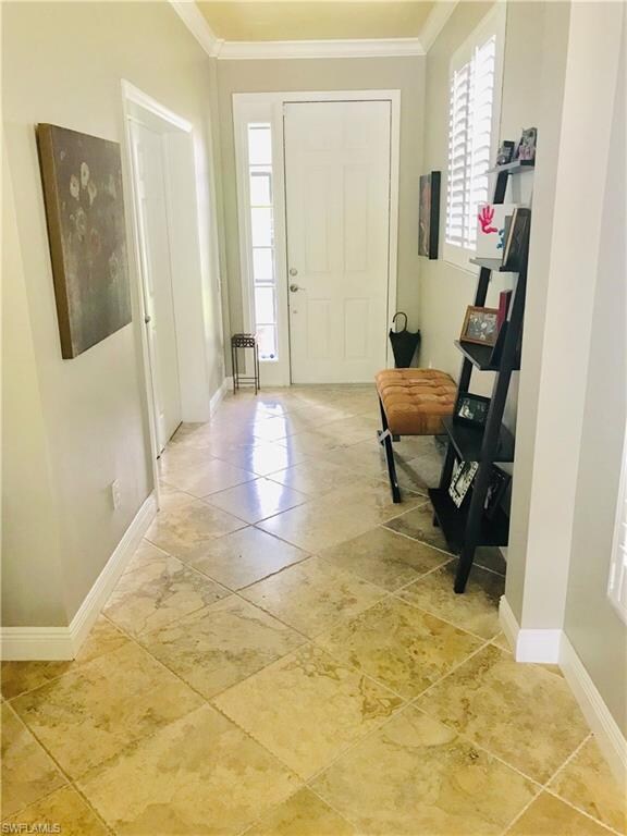 Entrance Door- views to pool upon entering