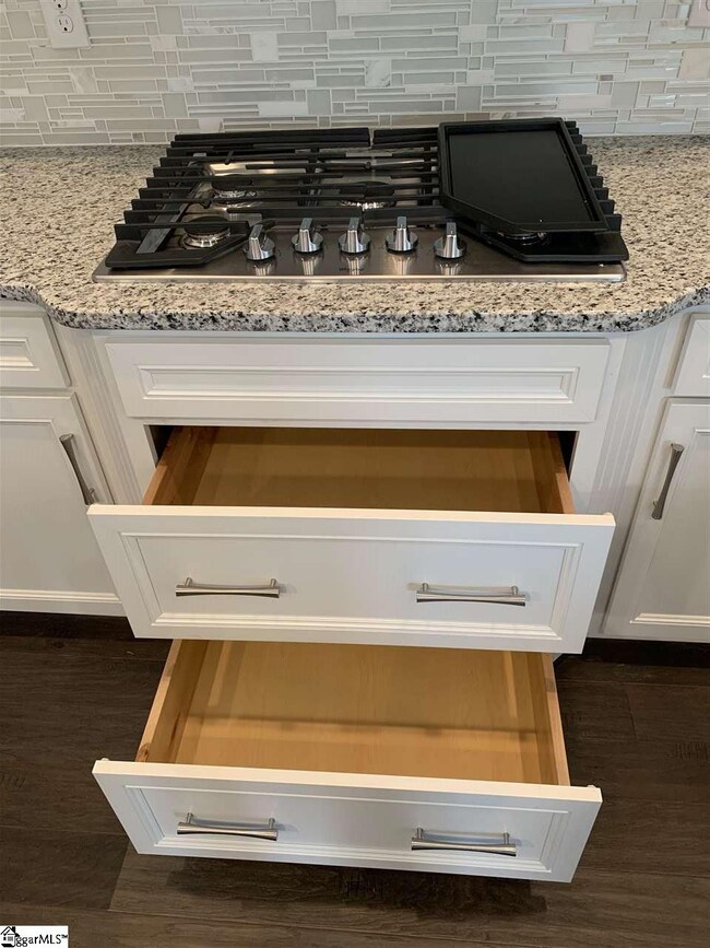 5 burner gas top with griddle and large drawer sta