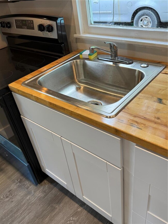 Kitchen Stainless Steel Sink, Butcher Clock Counters and New Fixxtures