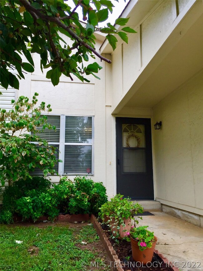 Covered Entrance. Storm Door with Screen option. S