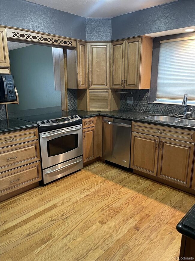 12381 E Vassar Dr, Aurora, CO 80014 - photo 4