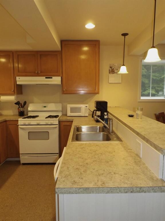 Kitchen has breakfast bar, double...
