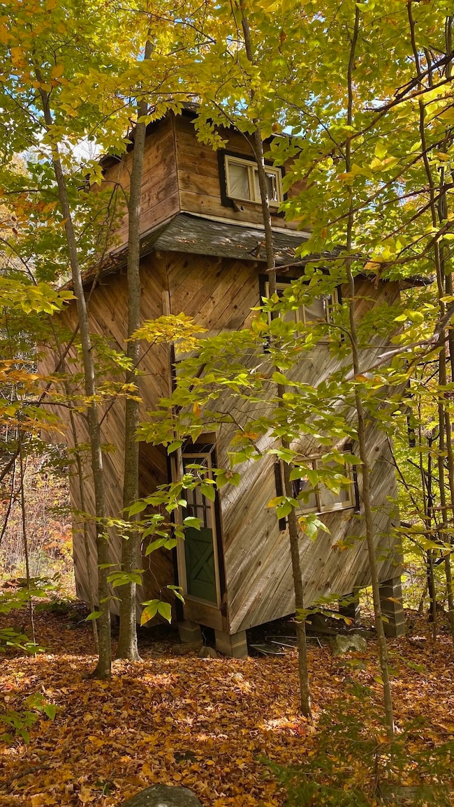 AS IS - unfinished 3-story building - needs work.