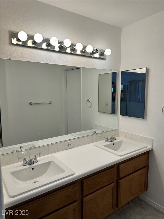 Full bathroom featuring double vanity