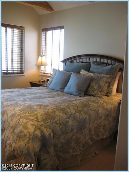 Master bedroom in upper unit