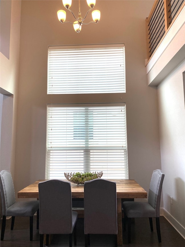 Dining room with tall ceilings and great natural l
