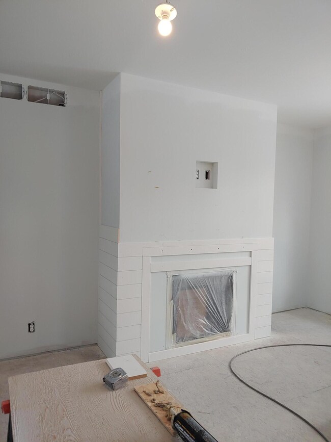 SP 5 Fireplace shiplap installaction beg