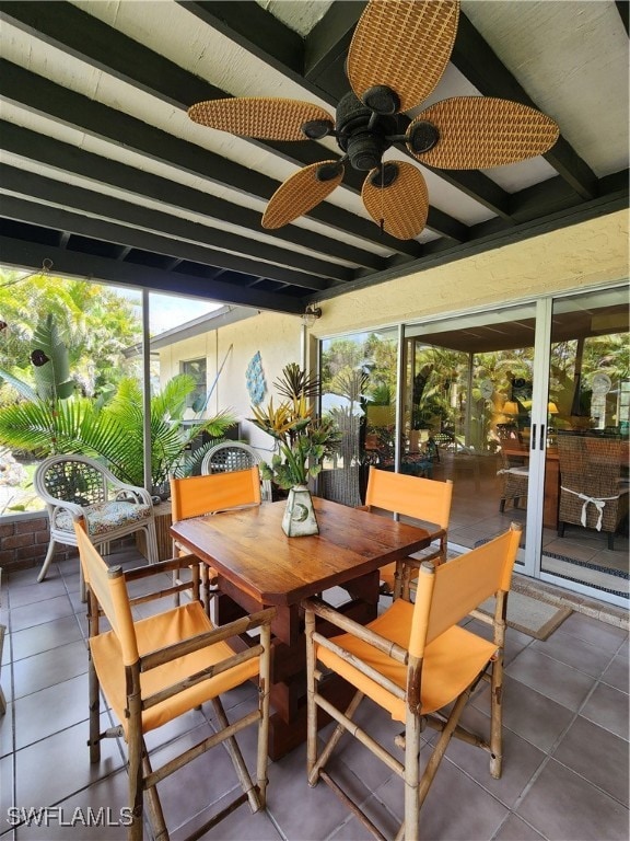 Sunroom / solarium featuring outdoor dining space,