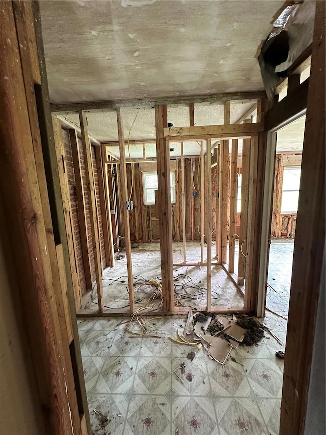Misc room with tile patterned floors