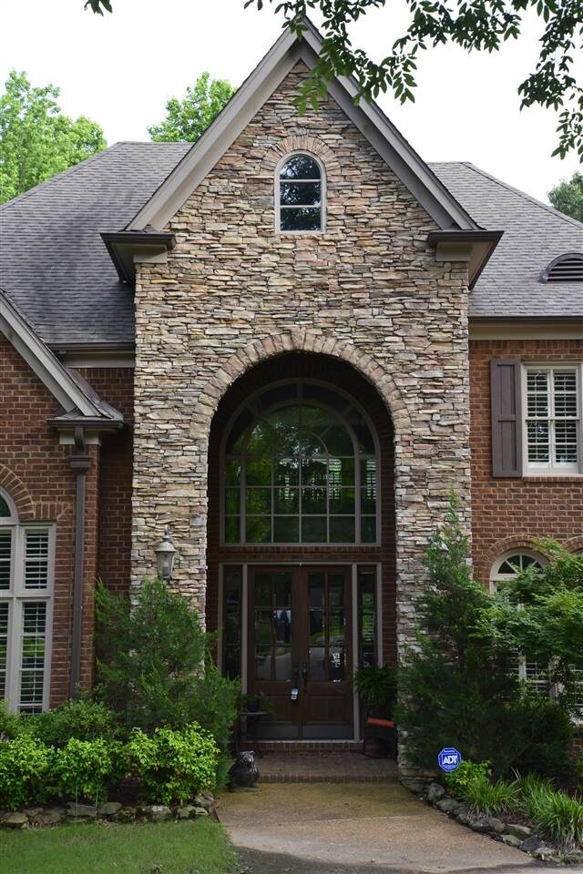 Gorgeous stone work around front entry.