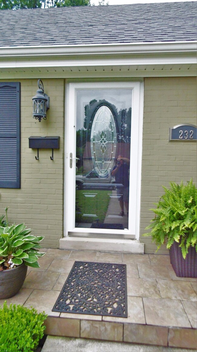 Charming front door is updated, yet very