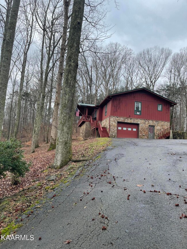 Front of house coming up driveway