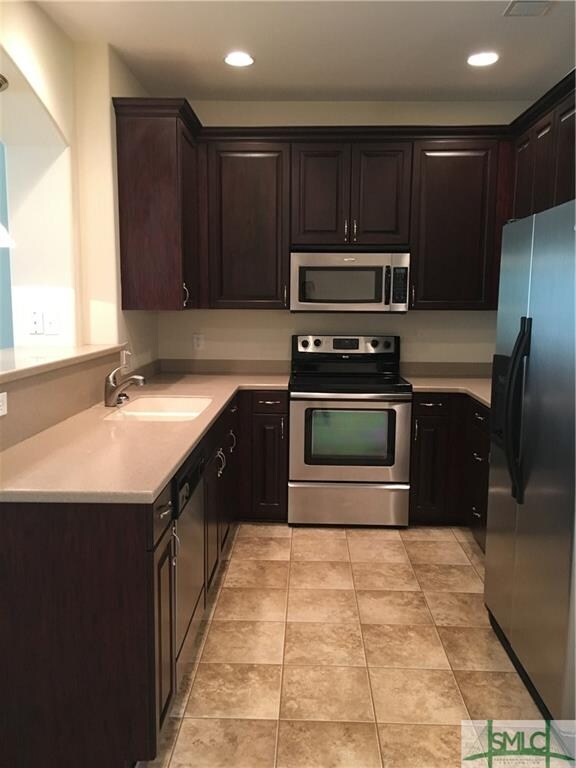 Stainless steel appliances and granite counter top
