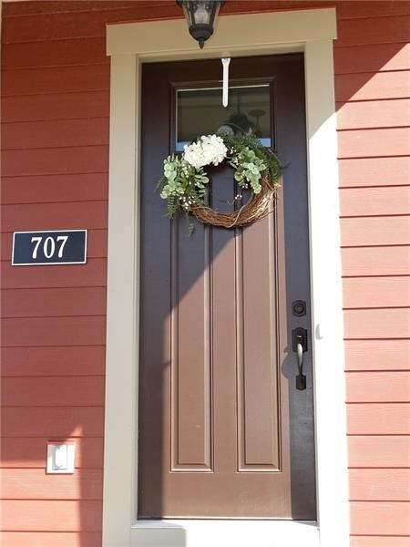 Be greeted by the solid craftsman door that enters