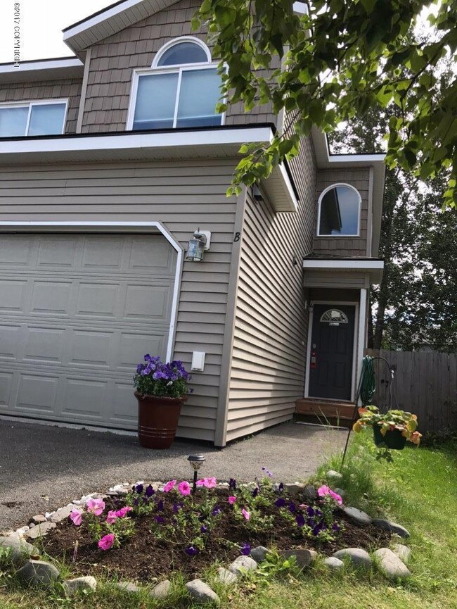 front of home with flower bed.jpg