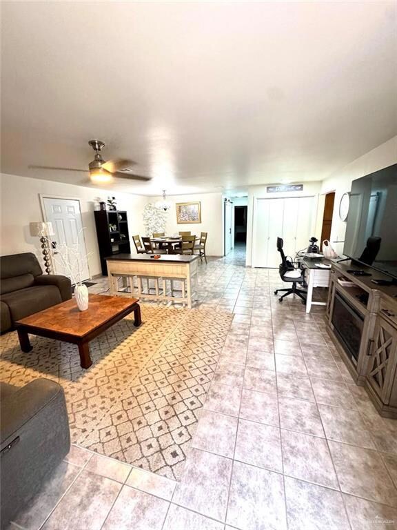 Living room featuring light tile patterned flooring