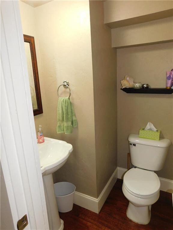 Downstairs half bathroom is right off the dining r