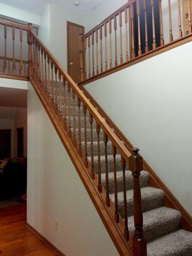 Oak stair case at the entry.