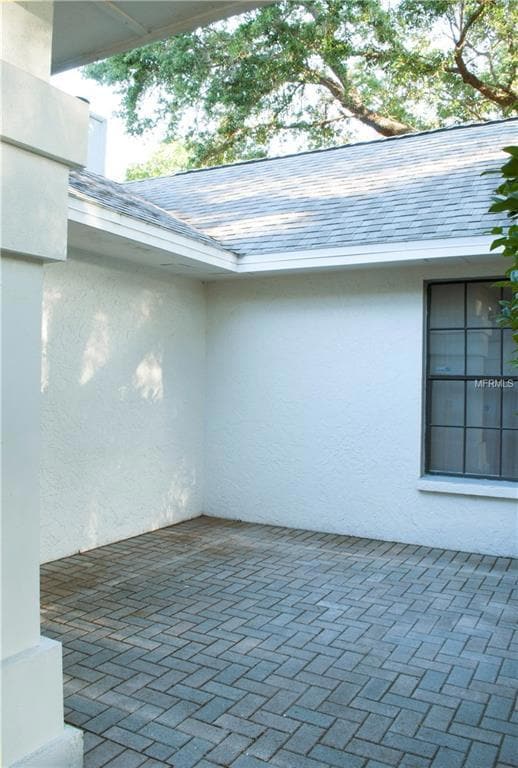 The front patio with brick pavers