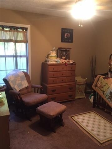 Bedroom #2 currently being used as nursery.