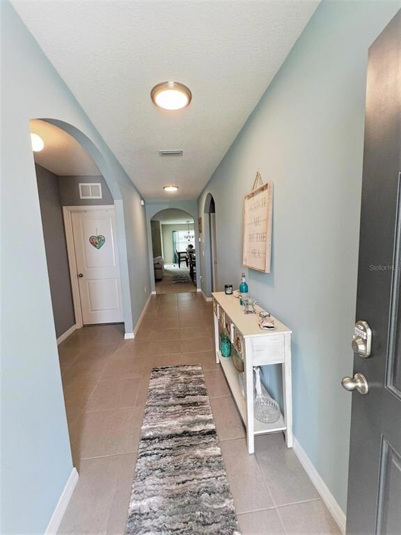 laundry room and garage to right