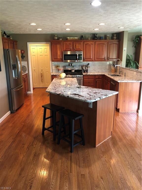 Updated Kitchen with Hardwood Floors, Cherry Cabin