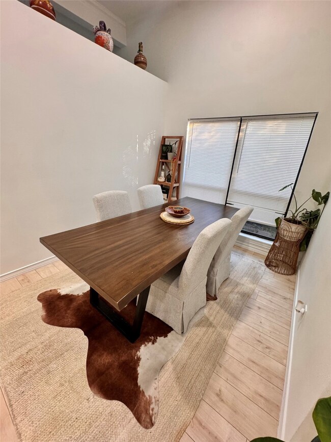 Dining area featuring light wood-style floors