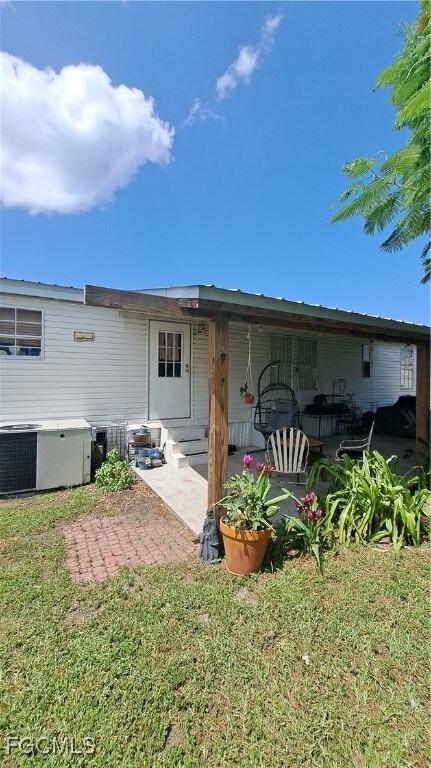 Back of property featuring a patio