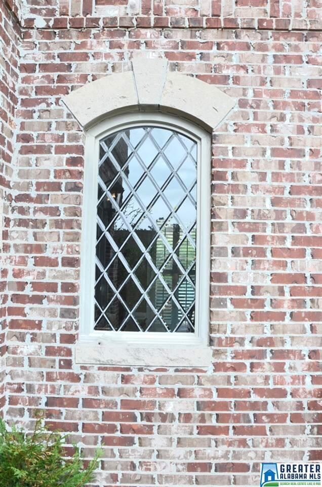 So many custom touches, limestone window accents