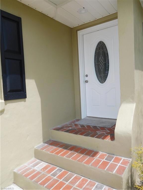 Inviting Front Door & covered porch.