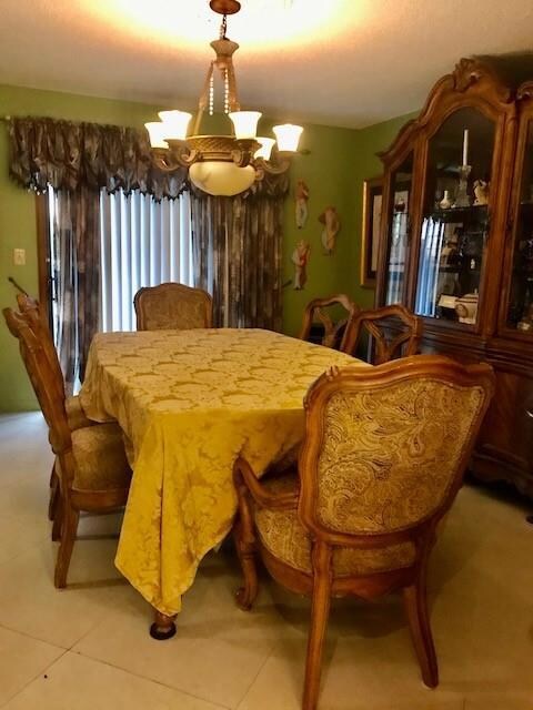 Dinning area, sliding door leading to storage area
