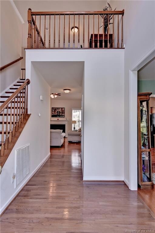 2 Story entry foyer with hardwood floors.