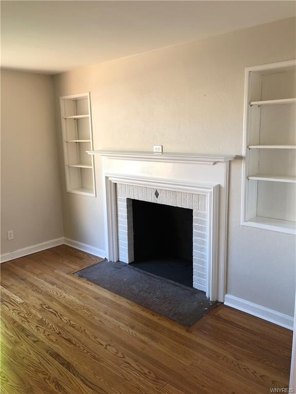 Wood burning fireplace with built-ins
