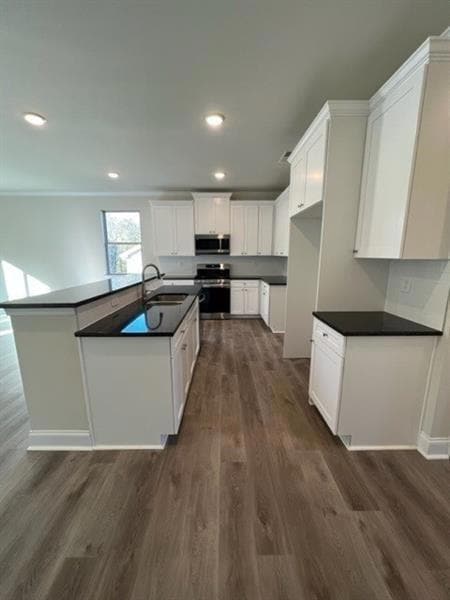 Kitchen featuring dark hardwood / wood-style floor