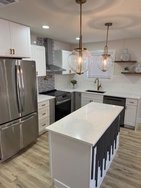 Kitchen with range, light wood-style floors, venti