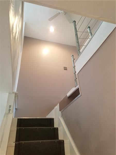 Loft-style staircase enhances the feel of this gem