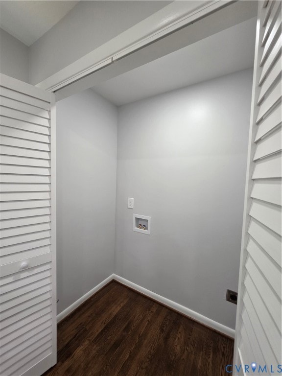 Laundry area with dark wood-type flooring and washer hookup