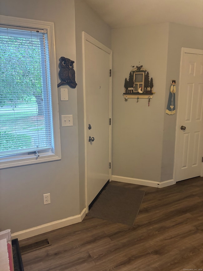 Foyer - also can serve as an eating area. Complete with coat closet and powder room.