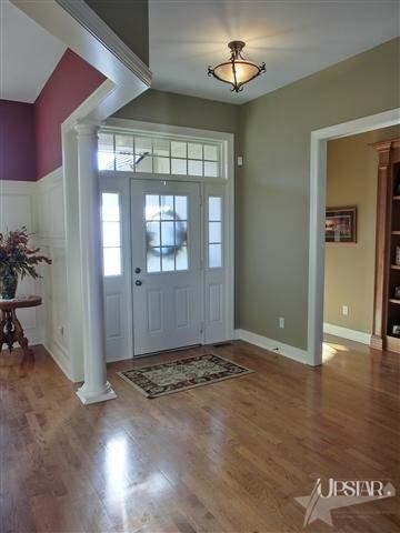 A spacious wood floored foyer