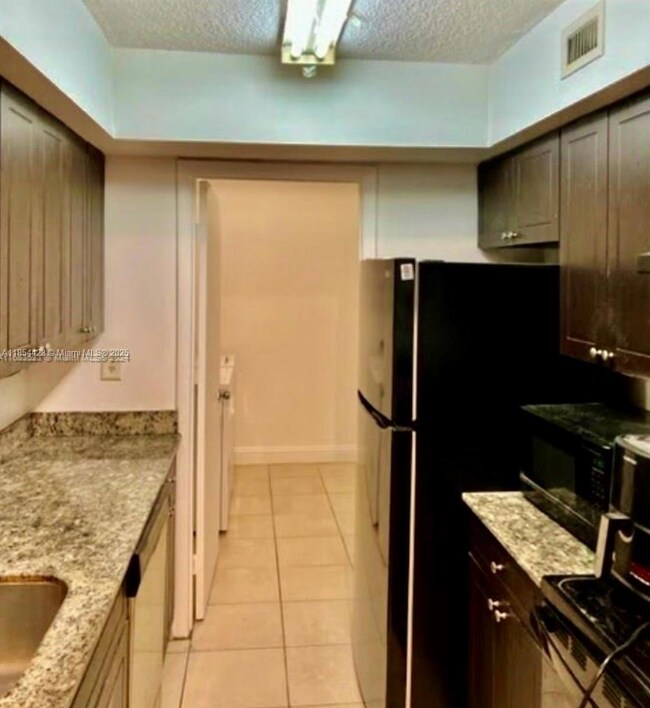 5720 Rock Island Rd unit 385, Tamarac, FL 33319 - photo 4