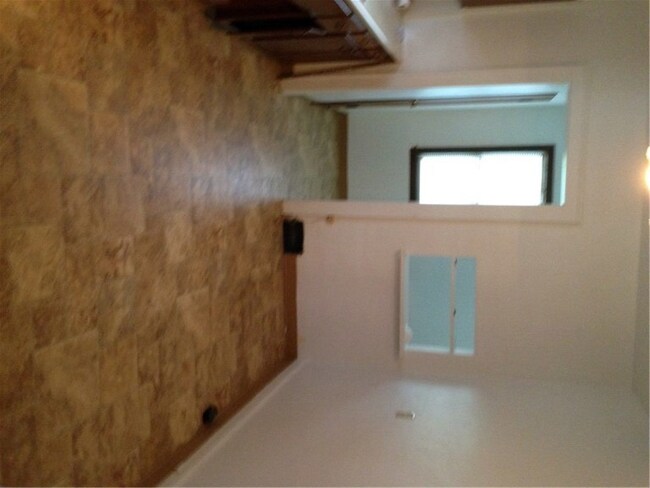 Kitchen with doorway leading to breakfast nook