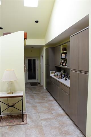 Door from DBL carport. More custom cabinetry with 