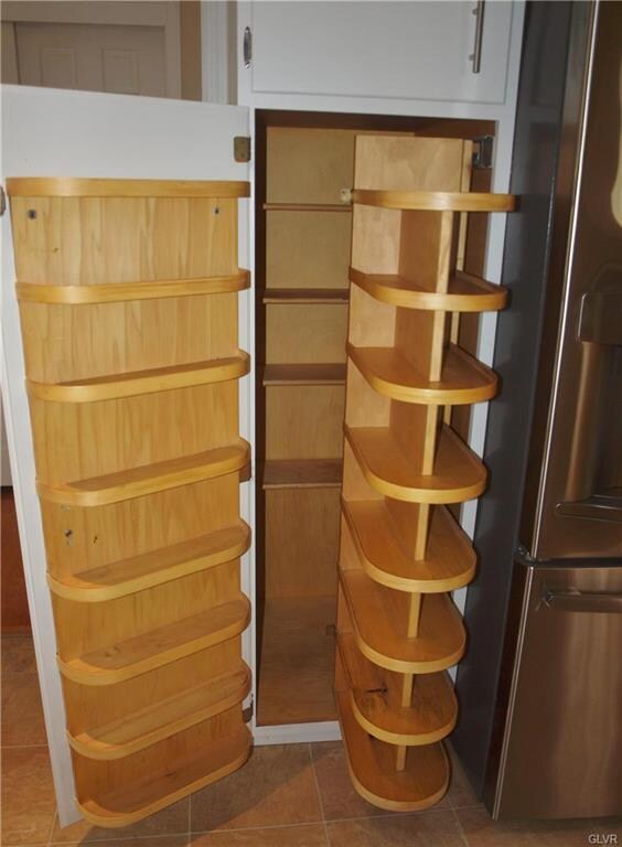 Pantry next to fridge has this fantastic pull-out 
