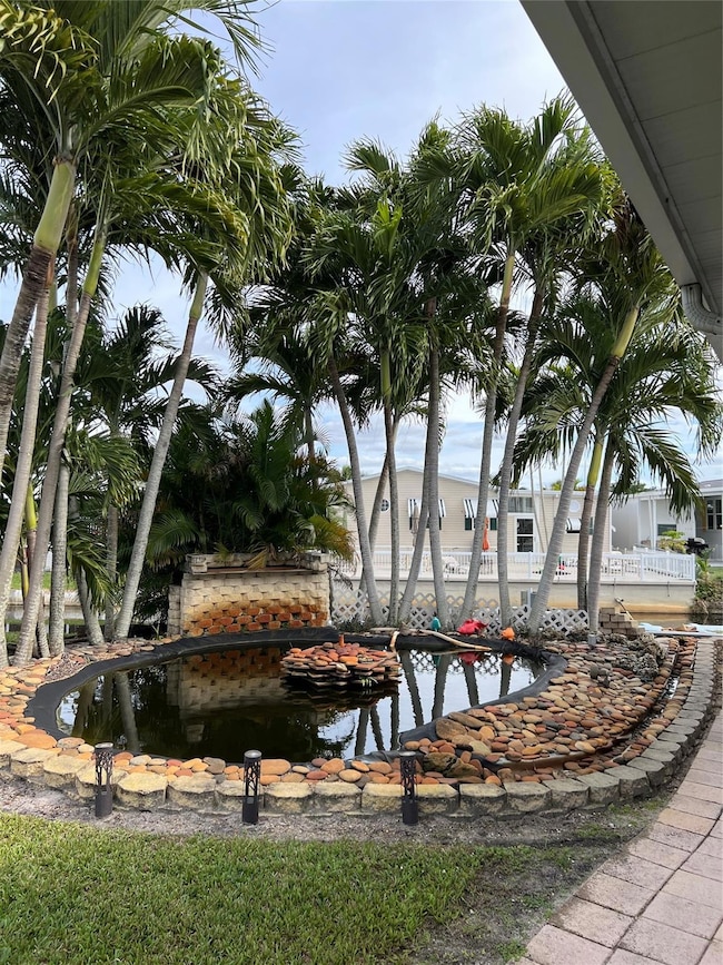 Fountain and Pond on side of home