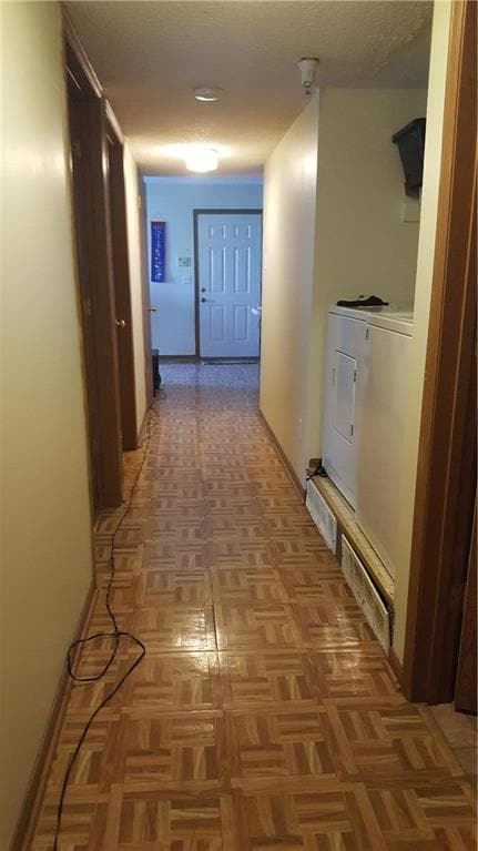 Looking down the hallway - laundry in convenient l